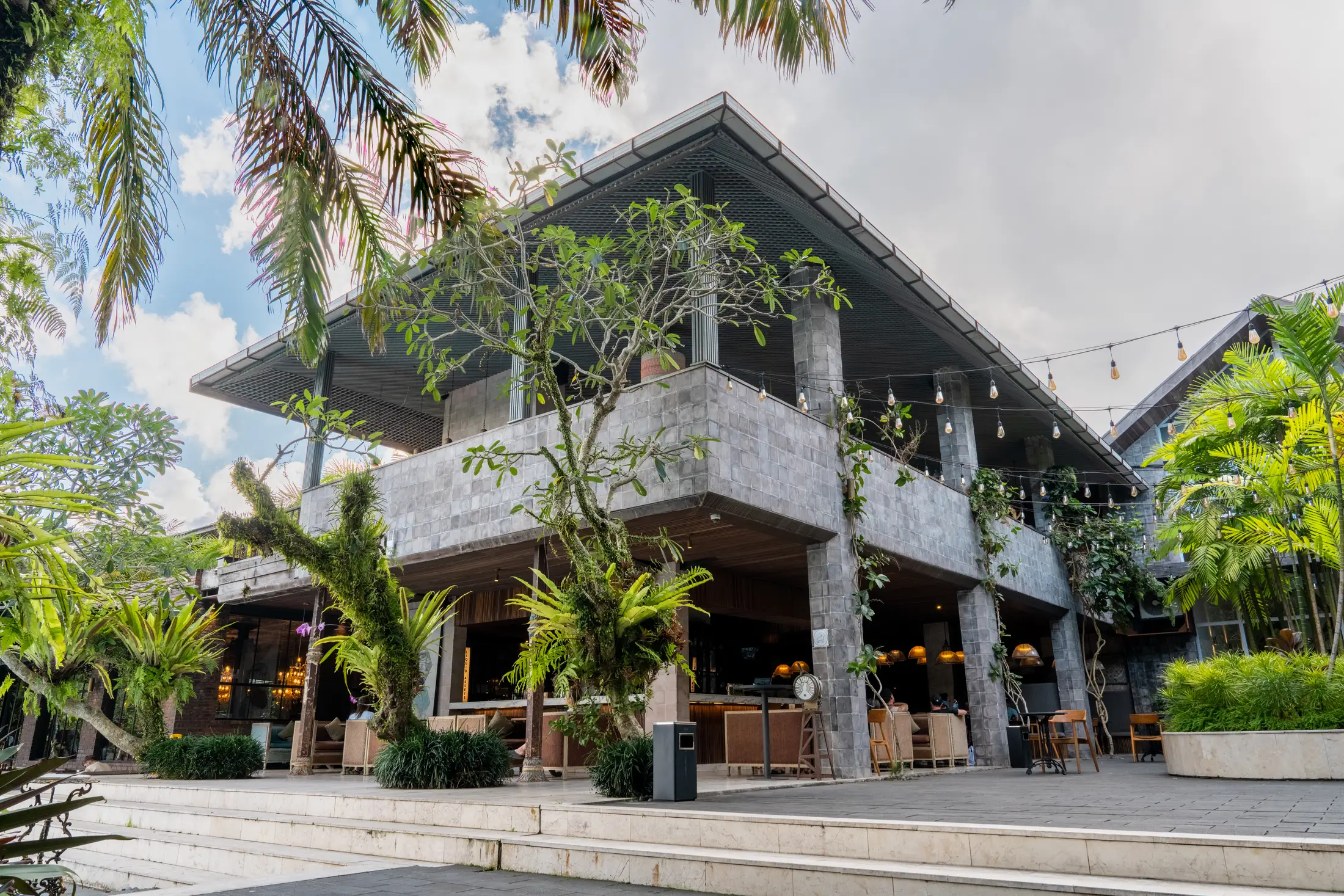 ONYX campus café terrace amid tropical greenery